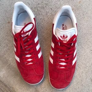 Red and white adidas gazelle sneakers